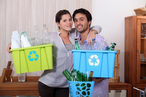 Bags of separated recyclables ready for transfer at a domestic clearance
